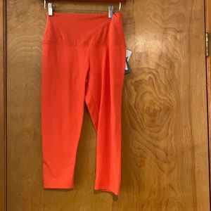 Orange Capri leggings. Quality
